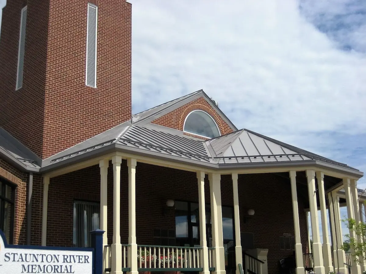Skilled roofing craftsmen working on a residential roof in Atlantic Highlands